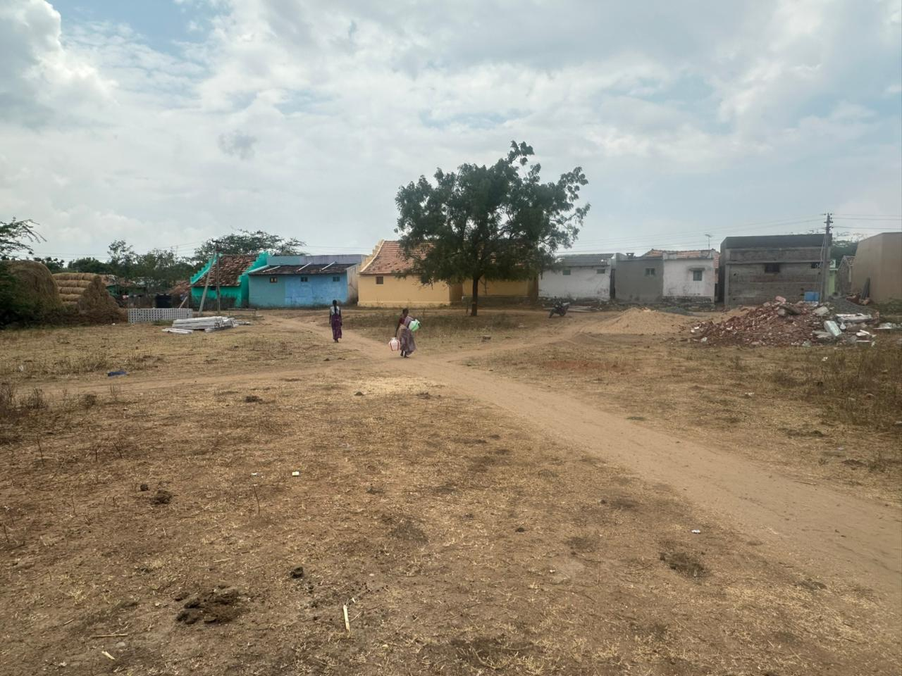 Women walking back to the village carrying water